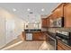 Modern kitchen with stainless steel appliances and granite countertops at 9119 Sw 70Th Loop, Ocala, FL 34481