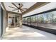 Bright screened porch with view into the kitchen and backyard at 9119 Sw 70Th Loop, Ocala, FL 34481