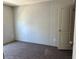 Spacious bedroom with neutral carpeting and walls at 9160 Sw 31St Avenue Rd, Ocala, FL 34476