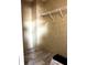 Functional closet with neutral colored walls and wire rack shelf, with a plank flooring adds to the room's appeal at 9160 Sw 31St Avenue Rd, Ocala, FL 34476