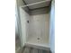 A clean white shower stall features a built-in seat and new fixtures at 9160 Sw 31St Avenue Rd, Ocala, FL 34476
