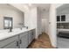 Modern bathroom with double vanity and view of bedroom at 9780 Sw 42Nd Ave, Ocala, FL 34476