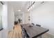 Modern dining room with dark wood table and open concept at 9780 Sw 42Nd Ave, Ocala, FL 34476