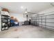 Garage with storage shelving and large door at 9780 Sw 42Nd Ave, Ocala, FL 34476