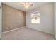 Neutral bedroom with carpet flooring, ceiling fan, and natural light from window at 9858 Sw 75Th Street Rd, Ocala, FL 34481