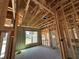 A new construction interior featuring wood framing and block walls, offering a glimpse of a home's structure at 10 Spruce Pass, Ocala, FL 34472