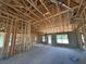 A new construction interior featuring wood framing and block walls, offering a glimpse of a home's structure at 10 Spruce Pass, Ocala, FL 34472