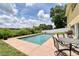 Expansive pool and patio with seating for outdoor enjoyment at 10170 Se 106Th Ln, Belleview, FL 34420