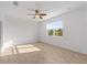 Bright bedroom with tile floors and large window at 10277 Sw 96Th Loop, Ocala, FL 34481