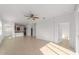 Bright living room with tile floors and ceiling fan at 10277 Sw 96Th Loop, Ocala, FL 34481