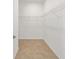 Walk-in closet with wire shelving and tile flooring at 10306 Sw 99Th Ln, Ocala, FL 34481