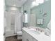 Clean bathroom with tub shower combination and vanity at 10339 Sw 96Th Ln, Ocala, FL 34481