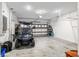 Garage with golf cart and overhead storage at 10339 Sw 96Th Ln, Ocala, FL 34481