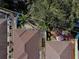 Aerial view of a community of tan houses with brown roofs at 17074 Se 75Th Wickson Ct, The Villages, FL 32162