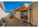 Spacious backyard patio with striped awning, perfect for outdoor entertaining at 17074 Se 75Th Wickson Ct, The Villages, FL 32162