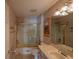 Neat bathroom with tub, shower, and vanity at 17074 Se 75Th Wickson Ct, The Villages, FL 32162