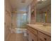 Bathroom boasts a tub, shower, and updated vanity at 17074 Se 75Th Wickson Ct, The Villages, FL 32162