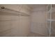 Spacious walk-in closet with wire shelving at 17074 Se 75Th Wickson Ct, The Villages, FL 32162