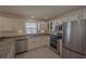 Clean and bright kitchen featuring stainless steel appliances at 17074 Se 75Th Wickson Ct, The Villages, FL 32162