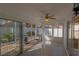 Sunroom with tiled floor and fan at 17074 Se 75Th Wickson Ct, The Villages, FL 32162