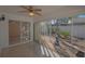 Bright sunroom featuring a ceiling fan at 17074 Se 75Th Wickson Ct, The Villages, FL 32162