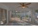 Sunroom with sliding glass doors and backyard view at 17074 Se 75Th Wickson Ct, The Villages, FL 32162