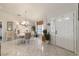 Elegant dining room with a round table and white chairs at 17470 Se 115Th Terrace Rd, Summerfield, FL 34491