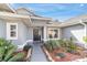 Front entry with walkway and landscaping at 17470 Se 115Th Terrace Rd, Summerfield, FL 34491