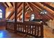 Spacious loft area with wood floors and exposed beams; open and airy at 1838 Sw 97Th Pl, Ocala, FL 34476