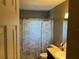 Clean bathroom with shower stall and updated vanity at 200 Nw 53 Ct, Ocala, FL 34482