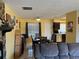 Bright dining area with table and chairs, view into kitchen at 200 Nw 53 Ct, Ocala, FL 34482