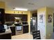 Kitchen with stainless steel appliances and granite counters at 200 Nw 53 Ct, Ocala, FL 34482