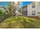 Two-story townhome with private balcony and green space at 231 Ne 28Th Ave # 301, Ocala, FL 34470