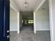 Inviting foyer with tile flooring, neutral colors, and an open view to the living area at 35 Locust Radial Cir, Ocala, FL 34472