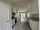 Modern kitchen featuring stainless appliances, granite countertops, and ample storage at 35 Locust Radial Cir, Ocala, FL 34472