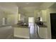 Modern kitchen design boasts granite countertops, stainless appliances, and recessed lighting at 35 Locust Radial Cir, Ocala, FL 34472
