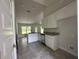 Bright kitchen showcasing granite countertops, stainless appliances, and ample lighting at 35 Locust Radial Cir, Ocala, FL 34472