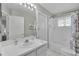 Clean bathroom with a shower/tub combo and white vanity at 3708 Doune Way, Clermont, FL 34711