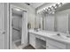 Double vanity bathroom with a walk-in shower at 3708 Doune Way, Clermont, FL 34711