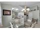 Bright dining area adjacent to kitchen with a view into kitchen at 3708 Doune Way, Clermont, FL 34711