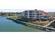 Aerial view showcasing waterfront location and building at 438 Bouchelle Dr # 401, New Smyrna Beach, FL 32169