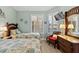 Spacious bedroom with twin beds and coastal decor at 438 Bouchelle Dr # 401, New Smyrna Beach, FL 32169