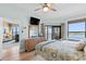 Main bedroom with stunning water views and ample dresser space at 438 Bouchelle Dr # 401, New Smyrna Beach, FL 32169