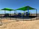 Modern playground with two green shade canopies at 4421 Sw 90Th Pl, Ocala, FL 34476