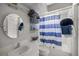 Bathroom with shower/tub combo and striped curtain at 5459 Sw 84Th Ln, Ocala, FL 34476