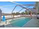 Inviting screened-in pool ready for relaxation at 5459 Sw 84Th Ln, Ocala, FL 34476