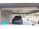 Covered carport with space for one vehicle and additional storage at 5991 Nw 61St Ct, Ocala, FL 34482