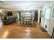 Farmhouse-style dining room with a white table and hutch at 5991 Nw 61St Ct, Ocala, FL 34482