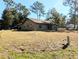 Ranch-style home with carport and spacious yard at 5991 Nw 61St Ct, Ocala, FL 34482