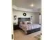 Large main bedroom with a king-size bed and decorative pillows at 7067 Hemlock Crse, Ocala, FL 34472